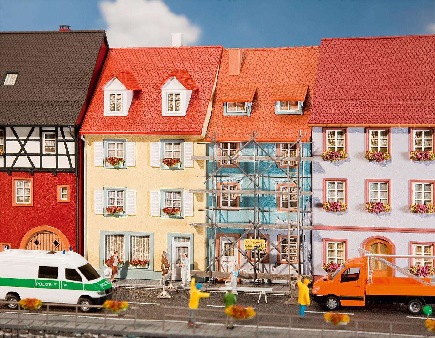 2 Village houses with painters scaffold